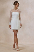 Unveila | Mini-robe blanche à encolure ronde avec détails en mesh