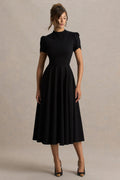 Vicky | Robe mi-longue noire à col montant et manches bouffantes